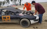 Brent Myrick and crewman checking the engine before Sunday's race at the Lemoore Raceway. 